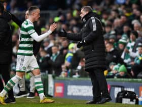 Celtic's David Turnbull shakes hands with his manager Ange Postecoglou after a rare start against Morton.