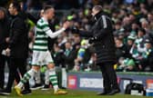 Celtic's David Turnbull shakes hands with his manager Ange Postecoglou after a rare start against Morton.