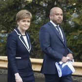 First Minister Nicola Sturgeon with Sanjeev Gupta, the head of the Liberty Group, ahead of a ceremony where Tata Steel handed over the keys of two Lanarkshire steel plants to metals firm Liberty House, at Dalzell steelworks in Scotland.