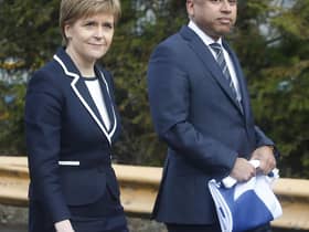 First Minister Nicola Sturgeon with Sanjeev Gupta, the head of the Liberty Group, ahead of a ceremony where Tata Steel handed over the keys of two Lanarkshire steel plants to metals firm Liberty House, at Dalzell steelworks in Scotland.
