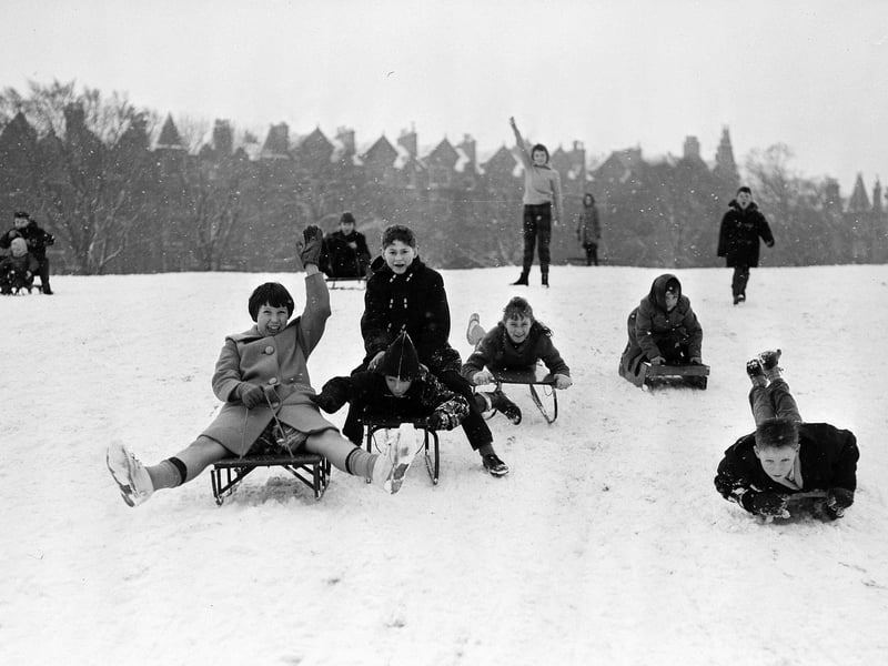 Some things never change and children on sledges are still attracted to the Meadows when snow falls - just like this group of youngsters pictured on Boxing Day 1961, with Warrender Park Terrace in the background.