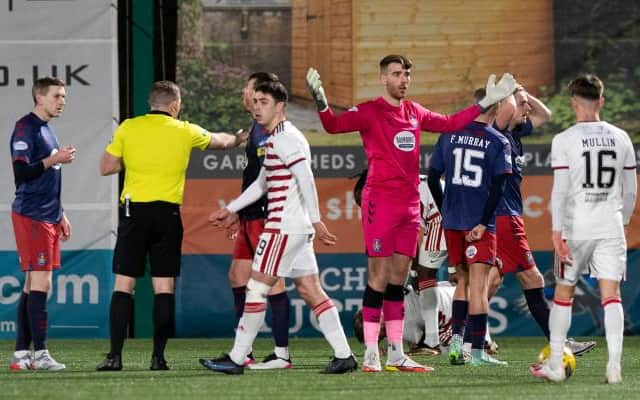 Kilmarnock goalkeeper Zach Hemming (centre) is sent off by referee John Beaton for a tackle on Hamilton's Andy Ryan during a Cinch Championship match between Hamilton and Kilmarnock at the Fountain of Youth Stadium, on December 26, 2021, in Hamilton, Scotland (Photo by Sammy Turner / SNS Group)