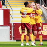 Motherwell's Mika Biereth scored on his debut as the Steelmen overcame Hibs.