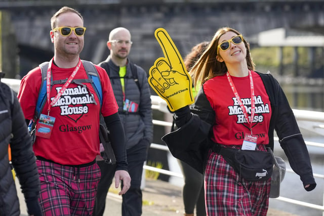 Kiltwalkers head along the River Clyde