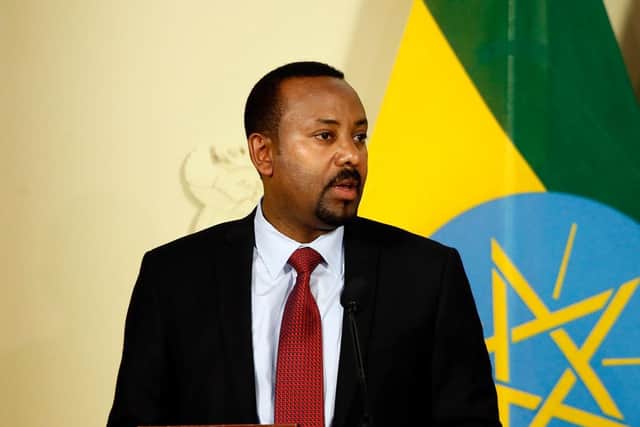 Prime minister Abiy Ahmed denounced the killing of people based on identity, adding that security forces had been deployed to the area and "started taking measures". (Photo by Phill Magakoe / AFP) (Photo by PHILL MAGAKOE/AFP via Getty Images)