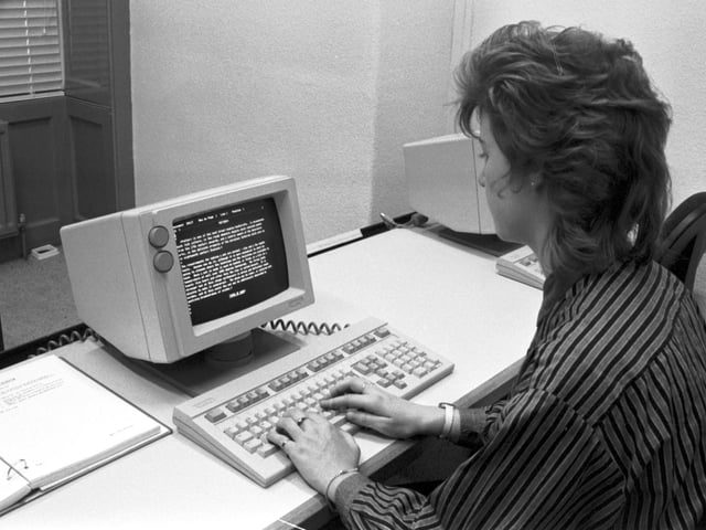 An employee using a Wang word-processor at Wang Computers in Edinburgh, February 1987.