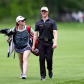 Craig Howie and his caddie on the 18th hole during the first round of the Volvo Car Scandinavian Mixed Hosted by Henrik & Annika at Halmstad Golf Club. Picture: Naomi Baker/Getty Images.