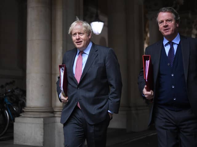 Boris Johnson returns to Downing Street with Scotland Secretary Alister Jack following a UK Cabinet meeting  (Picture: Leon Neal/Getty Images)