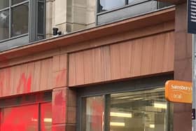 The scene outside the Sainsbury's on Buchanan Street in Glasgow, after red paint was thrown at the supermarket windows. Picture: Tim Moss/PA Wire