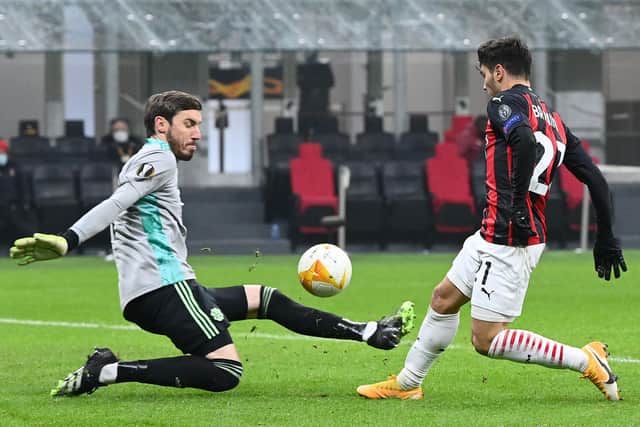 AC Milan's Spanish midfielder Brahim Diaz scores past Celtic's Greek goalkeeper Vasilis Barkas. Picture: Getty