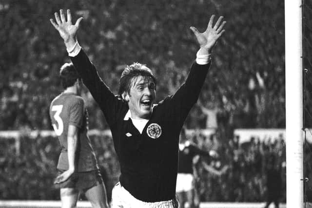 Kenny Dalglish celebrates Scotland's second goal, beating Wales to qualify for the World Cup finals in Argentina