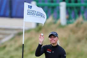 Charley Hull of England reacts to her birdie on the 18th green during day one of the AIG Women's Open at St Andrews. Picture: Michael Reaves/Getty Images.