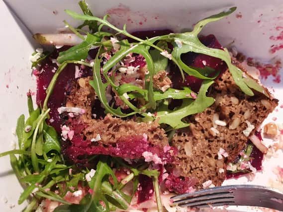 Beetroot and stilton salad served with buttered rye bread,pear and walnuts.