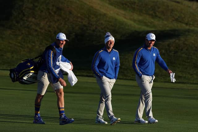 Viktor Hovland and Paul Casey walk up the first hole at Whistling Straits. Picture: Richard Heathcote/Getty Images.