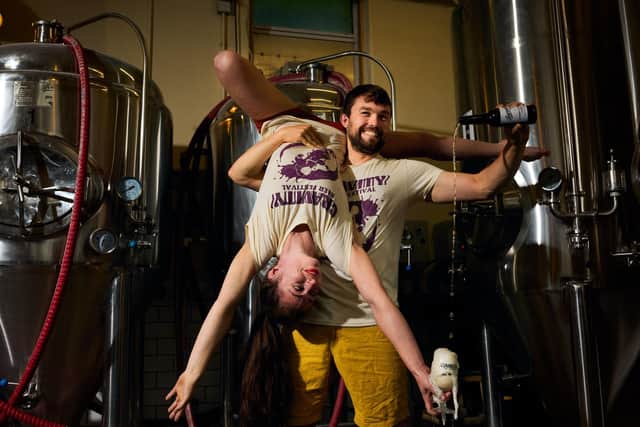 Acrobats Eric and Zinnia defy gravity at Barney's Beer to announce Gravity Beer Festival 2025.