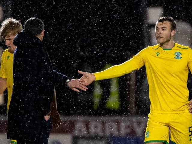 Hib's Ryan Porteous celebrates with his manager Jack Ross after the Easter Road side's victory over St Mirren. Photo by Ross Parker / SNS Group