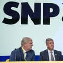 From left, Minister for Constitution and External Affairs Angus Robertson, Depute Leader Keith Brown and First Minister John Swinney during the SNP annual national conference at the Edinburgh International Conference Centre. Picture: Jane Barlow/PA Wire