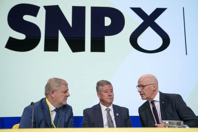 From left, Minister for Constitution and External Affairs Angus Robertson, Depute Leader Keith Brown and First Minister John Swinney during the SNP annual national conference at the Edinburgh International Conference Centre. Picture: Jane Barlow/PA Wire