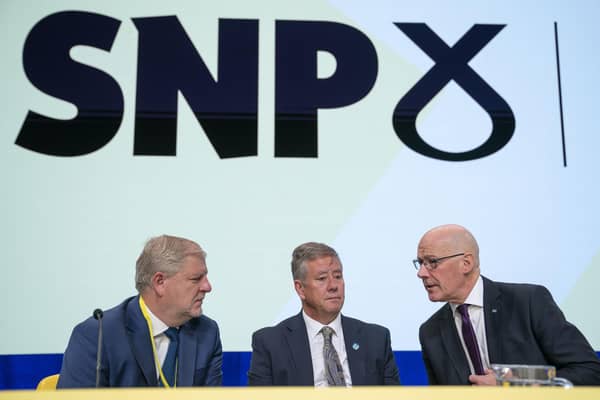 From left, Minister for Constitution and External Affairs Angus Robertson, Depute Leader Keith Brown and First Minister John Swinney during the SNP annual national conference at the Edinburgh International Conference Centre. Picture: Jane Barlow/PA Wire