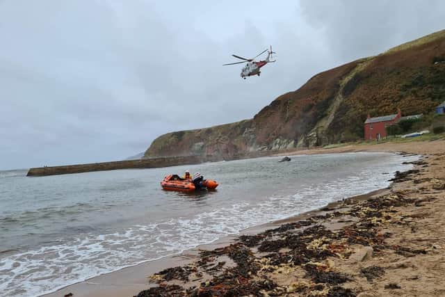 Rescue teams helped get the injured man to safety. Pic: Dunbar RNLI