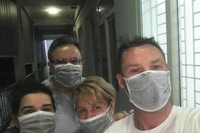 Jackie Becker, Alan Becker, Glenys Holmes and Eric Holmes who are in a hospital in Vietnam after testing negative for coronavirus.