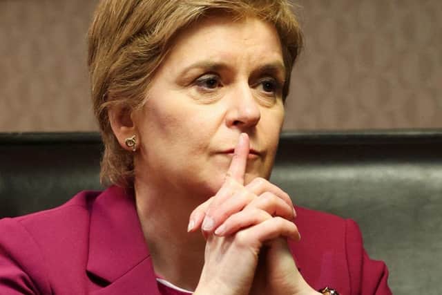 First Minister Nicola Sturgeon may take court action to stop you hearing lawyer's advice given to her on the legality of Indyref2 (Picture: RUSSELL CHEYNE/POOL/AFP via Getty Images)