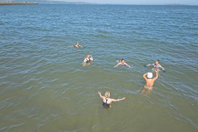 People enjoying a swim at Wardie Bay which has recently been granted official bathing water status (pic: SEPA)