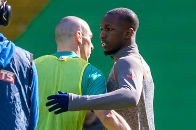 Celtic captain Scott Brown embraces Rangers' Glen Kamara prior to the Old Firm fixture in March. (Photo by Craig Williamson / SNS Group)
