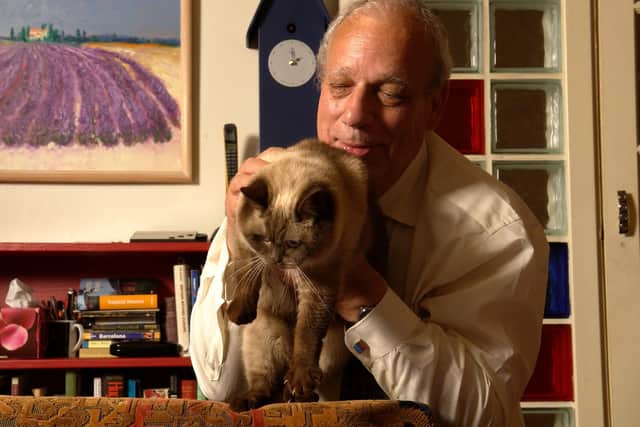 Bill Jamieson at home with Miss Lulubelle the Cat