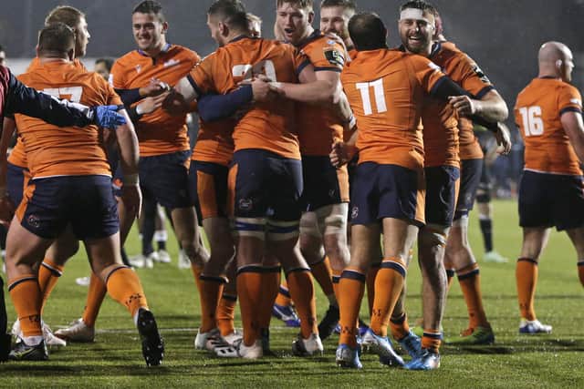 Edinburgh players celebrate at the final whistle after their Challenge Cup victory over Saracens last season. (Photo by Henry Browne/Getty Images)