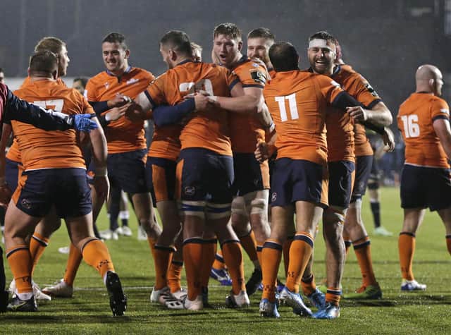 Edinburgh players celebrate at the final whistle after their Challenge Cup victory over Saracens last season. (Photo by Henry Browne/Getty Images)