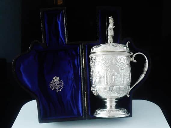 The tankard was gifted by Barry Sullivan.