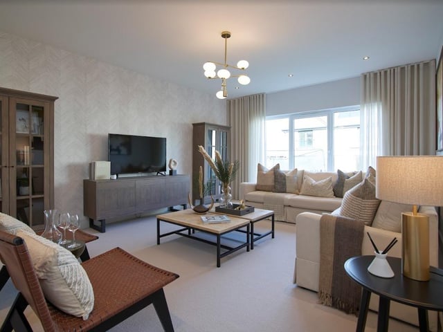 Exterior: Bi-folding doors in the garden room open onto a rear landscaped garden with patio.
Contact: Robertson Homes