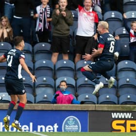 Dario Zanatta celebrates with Kyle Benedictus after Raith's third goal.  (Photo by Mark Scates / SNS Group)