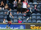 Dario Zanatta celebrates with Kyle Benedictus after Raith's third goal.  (Photo by Mark Scates / SNS Group)