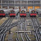 Piccadilly Line tube trains parked up at a depot near Boston Manor tube station in London