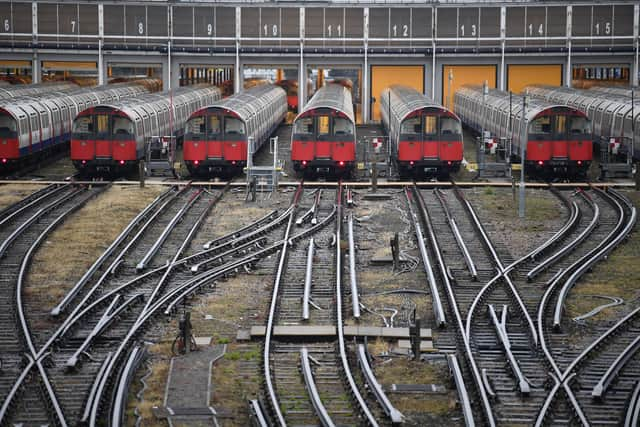 Piccadilly Line tube trains parked up at a depot near Boston Manor tube station in London