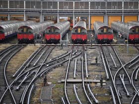 Piccadilly Line tube trains parked up at a depot near Boston Manor tube station in London
