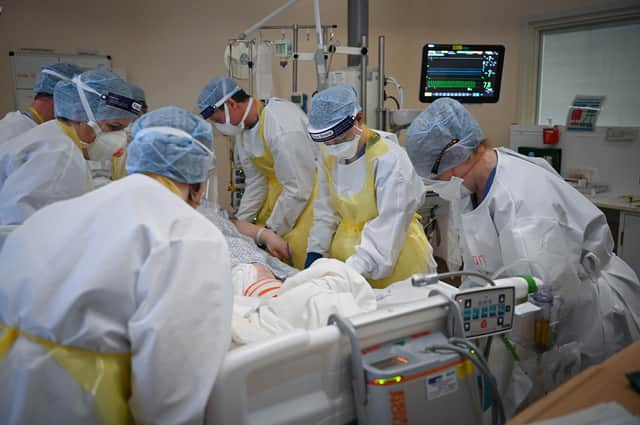 NHS staff attend to a Covid patient in University Hospital Monklands earlier this year (Picture: Jeff J Mitchell/Getty Images)