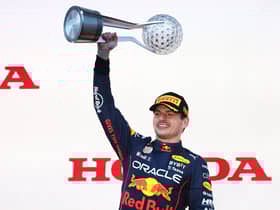 Race winner and 2022 F1 World Drivers Champion Max Verstappen of the Netherlands and Oracle Red Bull Racing celebrates on the podium during the F1 Grand Prix of Japan at Suzuka International Racing Course.