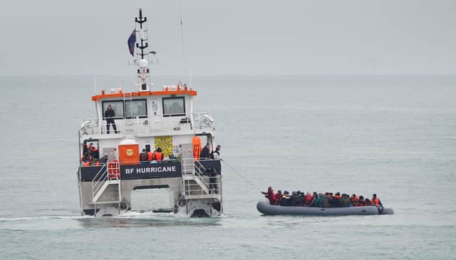 A group of people thought to be migrants are rescued off the coast of Folkestone, Kent
