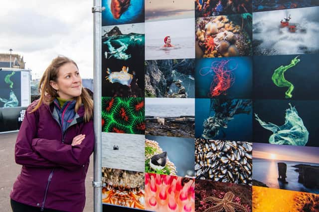 Curator Emily Raemakers at the launch of an outdoor Edinburgh Science Festival exhibition on Scotland’s seas and coasts which was able to go ahead this year on Portobello Promenade. Picture: Ian Georgeson