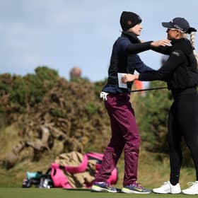 World No 1 Nelly Korda and 2023 runner-up Charley Hull embrace on the ninth green at the end of their second round in the AIG Women's Open at St Andrews. Picture: Ross Parker/R&A/R&A via Getty Images.