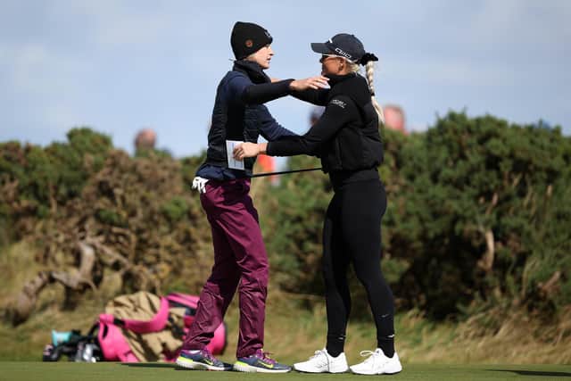World No 1 Nelly Korda and 2023 runner-up Charley Hull embrace on the ninth green at the end of their second round in the AIG Women's Open at St Andrews. Picture: Ross Parker/R&A/R&A via Getty Images.