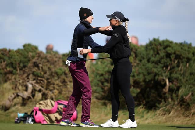 World No 1 Nelly Korda and 2023 runner-up Charley Hull embrace on the ninth green at the end of their second round in the AIG Women's Open at St Andrews. Picture: Ross Parker/R&A/R&A via Getty Images.