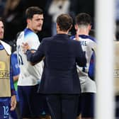 England manager Gareth Southgate speaks with Harry Maguire at full time following the win over Scotland.