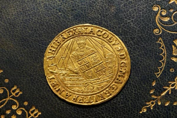 The gold coin of James VI which shows him on a galley boat holding the combined arms of England and Scotland. PIC: Contributed.