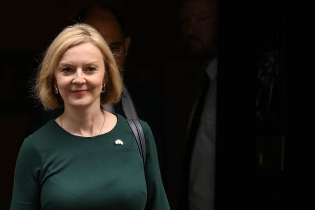 Prime Minister Liz Truss leaves 10 Downing Street, in London, for the House of Commons to announce her energy price plan. Picture: Daniel Leal/AFP via Getty Images