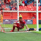 Aberdeen's Christian Ramirez scores and equaliser late on to make it 1-1 during a cinch Premiership match against Ross County at Pittodrie.