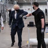 Britain's Prime Minister Boris Johnson tours the facility with managing director Jeff Pratt (left) as he meets a member of staff during a visit to the UK Battery Industrialisation Centre in Coventry. Picture: AFP via Getty Images






West Midlands.
15th July 2021 (Photo by David Rose / POOL / AFP) (Photo by DAVID ROSE/POOL/AFP via Getty Images)